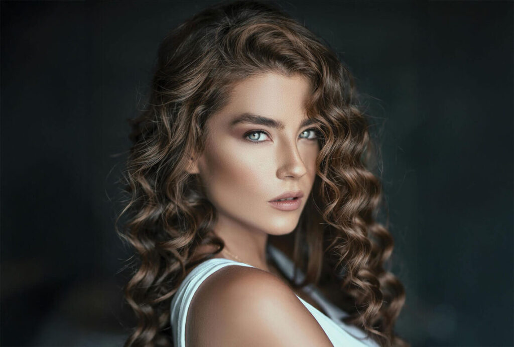 Beauty Blog Best Leave In Conditioner for Curly Hair. Photo Of Woman Wearing White Shirt