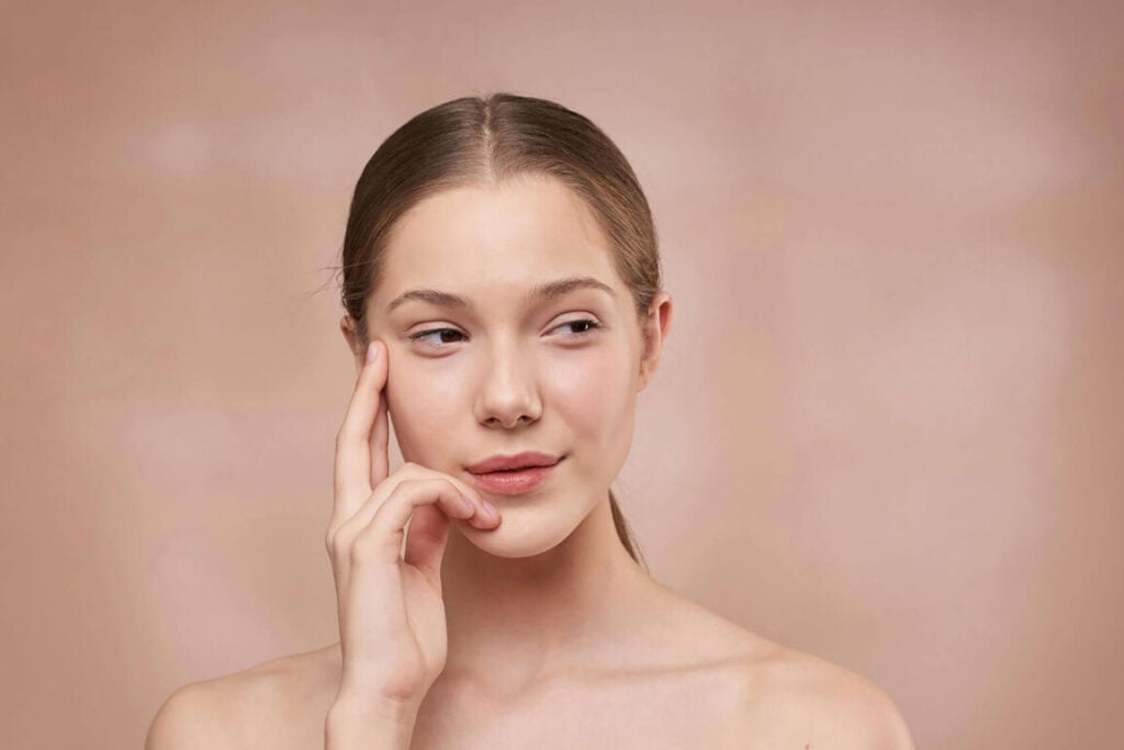 Beauty Blog Woman considering chemical vs physical exfoliation