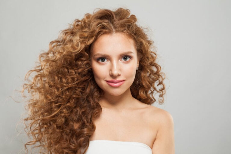 woman with natural red curly hair