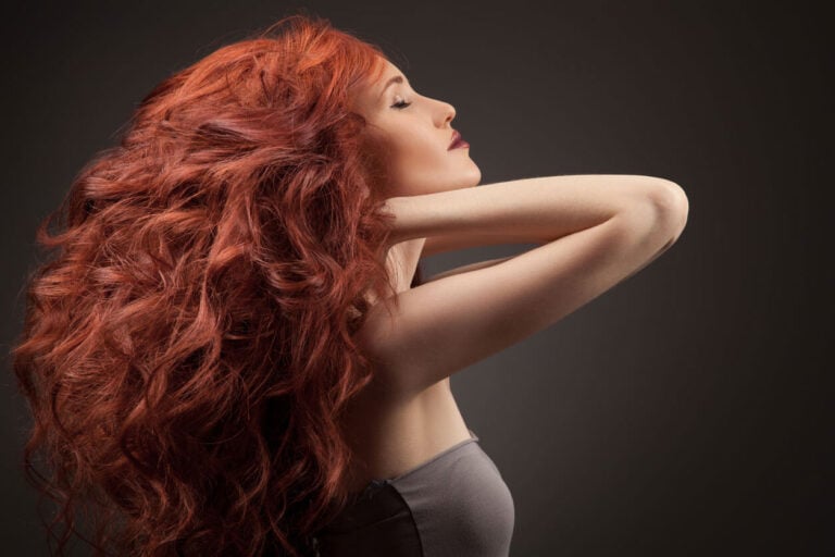 Beautiful woman with curly hairstyle