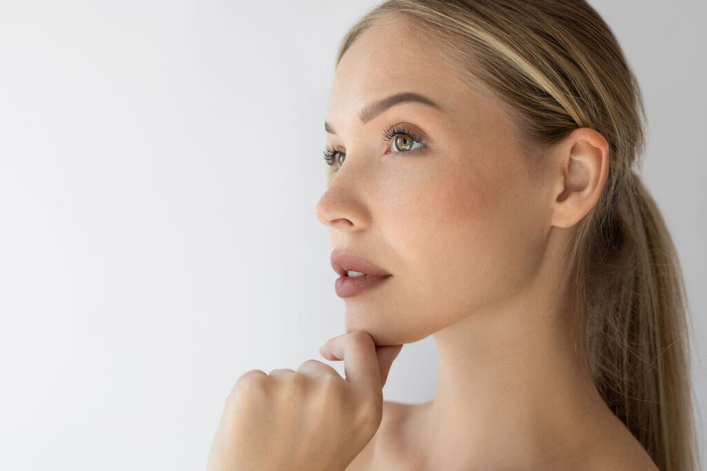 Beauty Blog woman with beautiful skin thinking of niacinamide skin benefits