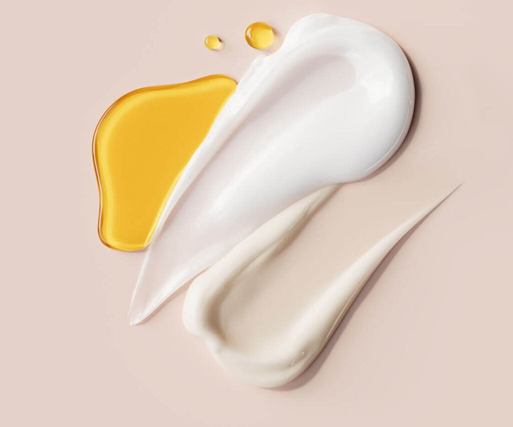 Beauty Blog White and beige lotion or cream swatches with oil puddle cosmetic product textures
