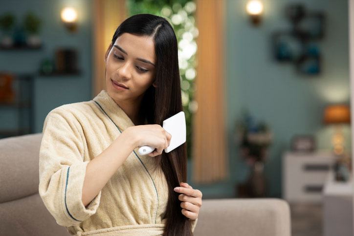 Hair Care Young Woman hair care stock photo