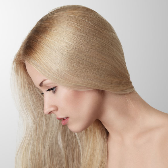 Beautiful blonde young woman stock photo
