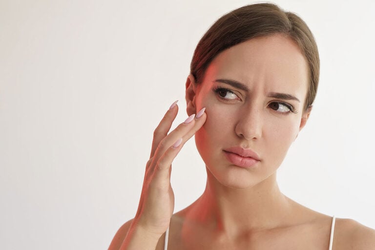 woman unhappy with her skin stock photo